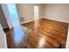 Large bedroom with hardwood floors and ample closet space at 15342 Millview Trace Ln, Mint Hill, NC 28227