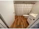 Clean bathroom featuring wood flooring and a shower/tub combo at 201 Riverview Ter, Lake Wylie, SC 29710