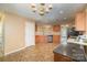 Eat-in kitchen with wood cabinets and a chandelier at 105 Ranlo Ave, Gastonia, NC 28054