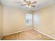 Spacious bedroom with neutral walls, ceiling fan, and window blinds at 105 Ranlo Ave, Gastonia, NC 28054