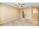 Living area with kitchen peek-a-boo and access to the hallway at 105 Ranlo Ave, Gastonia, NC 28054