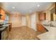 Kitchen with tile flooring, wood cabinets, and an island at 105 Ranlo Ave, Gastonia, NC 28054