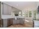 Modern kitchen with stainless steel appliances and white cabinetry at 4271 Candlewood Dr, Sherrills Ford, NC 28673