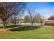 Community swimming pool with surrounding lawn and trees at 107 Ashton Dr, Mooresville, NC 28115