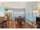 Breakfast nook with hardwood floors and built-in window seat at 14700 Old Vermillion Dr, Huntersville, NC 28078