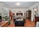 Large bedroom with hardwood floors and ample closet space at 173 W Pine St, Norwood, NC 28128