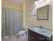 Basement bathroom with walk-in shower and modern vanity at 2618 Forest Lawn Dr, Matthews, NC 28104