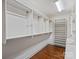 Large walk-in closet with ample shelving and hanging space at 2618 Forest Lawn Dr, Matthews, NC 28104