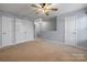 Bright bedroom with double doors and neutral decor at 4117 Rosfield Dr, Charlotte, NC 28214