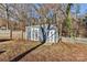 Large storage shed with barn-style doors in the backyard at 8443 Middleton Cir, Harrisburg, NC 28075