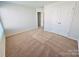 Bedroom with carpet, window and closet at 116 Lightning Dr, Shelby, NC 28152