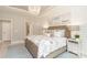 Spacious main bedroom with a king-size bed, stylish decor, and an ensuite bathroom at 1074 Kinship Dr # 110, Lancaster, SC 29720