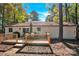 Spacious deck with seating area, perfect for outdoor entertaining, overlooks wooded backyard at 11116 Vista Canyon Dr, Charlotte, NC 28226