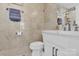 Bathroom with toilet, vanity, and marble tile at 11116 Vista Canyon Dr, Charlotte, NC 28226