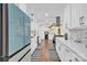 Modern kitchen with white cabinets and a large island at 11116 Vista Canyon Dr, Charlotte, NC 28226