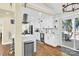 Modern kitchen with white cabinets, quartz countertops, and stainless steel appliances at 11116 Vista Canyon Dr, Charlotte, NC 28226