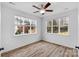 Spacious bedroom with large windows and wood-look floors at 1124 Woodwinds Dr, Waxhaw, NC 28173