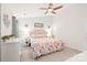 Spacious bedroom with a king bed and ceiling fan at 13965 Singleleaf Ln, Charlotte, NC 28278