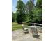 Wooden deck overlooking backyard with seating at 2484 Shelton Ave, Statesville, NC 28677