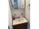 Small bathroom with vanity sink and mirror at 2484 Shelton Ave, Statesville, NC 28677