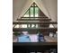 Open game room with pool table and vaulted ceiling at 2484 Shelton Ave, Statesville, NC 28677