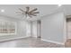 Living room with hardwood floors, recessed lighting, and a view of the backyard at 3007 Buffett Ln, Monroe, NC 28110