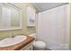 Clean bathroom with shower, sink, and toilet at 5112 Green Leaf Ct, Mount Holly, NC 28120