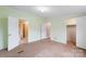 Spacious bedroom with carpet, doors to bathroom and closet at 5112 Green Leaf Ct, Mount Holly, NC 28120