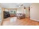 Living area featuring a fireplace and hardwood floors at 5112 Green Leaf Ct, Mount Holly, NC 28120