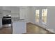 Kitchen features island, stainless steel appliances, and access to deck at 536 Fourth St # 9, Chester, SC 29706