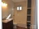 Updated bathroom features a tub, shower, and vanity with granite countertop at 536 Fourth St # 9, Chester, SC 29706