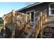 Elevated wooden deck with stairs leading to the ground at 536 Fourth St # 9, Chester, SC 29706