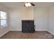 Living room featuring a wood burning stove and hardwood floors at 536 Fourth St # 9, Chester, SC 29706