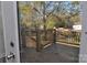 View from deck showing backyard and surrounding trees at 536 Fourth St # 9, Chester, SC 29706