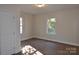 Bright bedroom with hardwood floors and large window at 536 Fourth St # 9, Chester, SC 29706