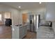 Modern kitchen with stainless steel appliances and island at 536 Fourth St # 9, Chester, SC 29706
