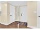 Inviting entryway with hardwood floors and a glass block window at 6920 Stillmeadow Dr, Charlotte, NC 28277