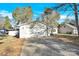 House exterior featuring a single-car garage and driveway at 6920 Stillmeadow Dr, Charlotte, NC 28277