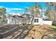 House exterior with a two-car garage and landscaping at 6920 Stillmeadow Dr, Charlotte, NC 28277