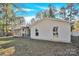 Back of house showcasing screened porch and deck at 6920 Stillmeadow Dr, Charlotte, NC 28277