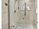 Clean and spacious shower with glass enclosure and tiled walls at 6920 Stillmeadow Dr, Charlotte, NC 28277