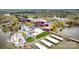 Aerial view of lakefront community with townhomes, condos, and an amenity center at 7112 Brookview Ln, Sherrills Ford, NC 28673