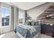 Cozy bedroom with city view wall art and ample light at 7112 Brookview Ln, Sherrills Ford, NC 28673