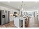 Modern kitchen with stainless steel appliances, an island, and white cabinetry at 7112 Brookview Ln, Sherrills Ford, NC 28673