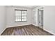 Home office with wood-look flooring and French doors at 7317 Frances Irene Dr, Charlotte, NC 28215