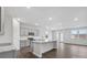 Modern kitchen with island, stainless steel appliances, and granite countertops at 801 Hallman Branch Ln, Lincolnton, NC 28092