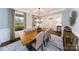 Spacious dining room with hardwood floors and large windows at 8024 Plymouth Dr, Sherrills Ford, NC 28673