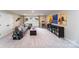 Spacious bonus room with grey sectional sofa, large windows, and plenty of natural light at 8024 Plymouth Dr, Sherrills Ford, NC 28673