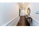Bright and airy entryway with hardwood floors and built-in console table at 8024 Plymouth Dr, Sherrills Ford, NC 28673