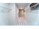 Large walk-in closet with wire shelving and carpet flooring at 8024 Plymouth Dr, Sherrills Ford, NC 28673